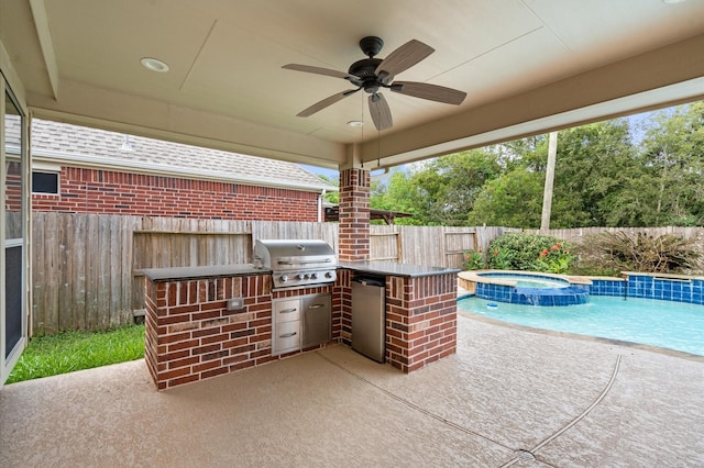 view of patio featuring an outdoor kitchen, ceiling fan, a swimming pool with hot tub, grilling area, and an outdoor bar