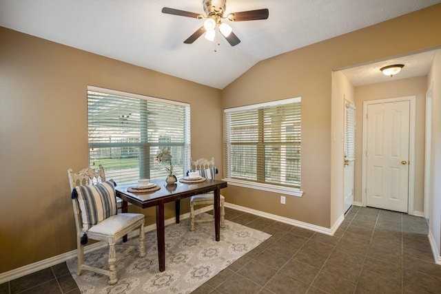 tiled home office with ceiling fan and lofted ceiling