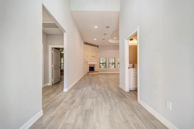 corridor featuring light hardwood / wood-style floors