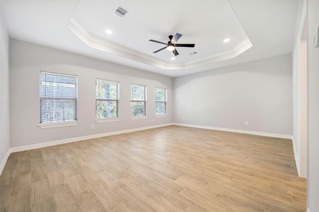 250 Broadmoor Dr, Huntsville, TX 77340 - empty room with a tray ceiling, visible vents, crown molding, and ceiling fan