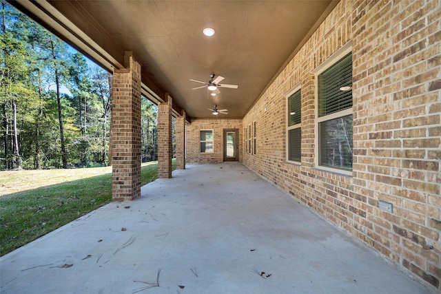 view of patio / terrace featuring ceiling fan