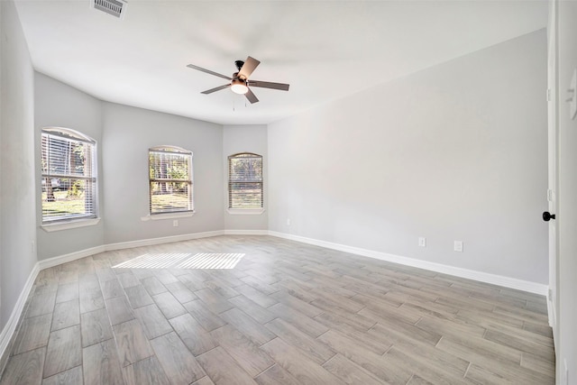 250 Broadmoor Dr, Huntsville, TX 77340 - spare room featuring baseboards, light wood-style flooring, visible vents, and ceiling fan
