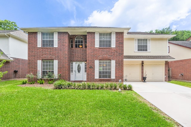 view of front facade with a front lawn and a garage