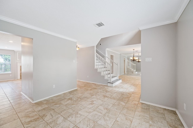 empty room featuring a chandelier and crown molding