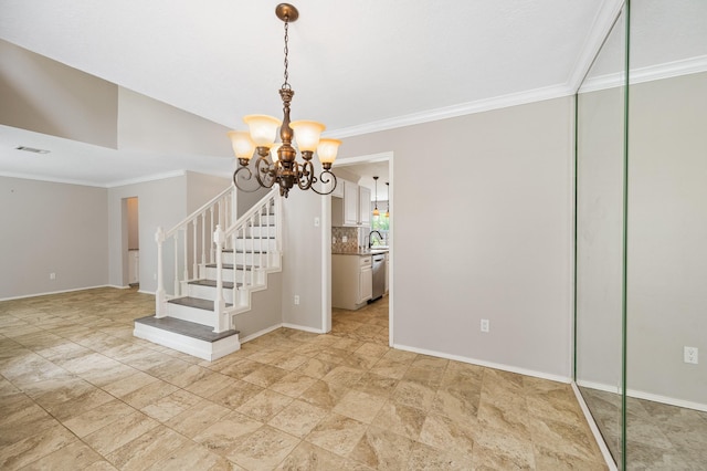 interior space with sink, crown molding, and an inviting chandelier