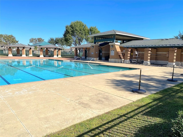 18539 Windy Knoll Way, Houston, TX 77084 - community pool with a gazebo and a patio area