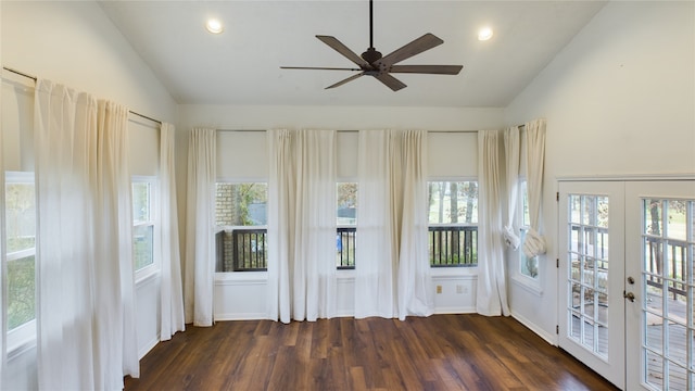 unfurnished sunroom with ceiling fan, lofted ceiling, and french doors