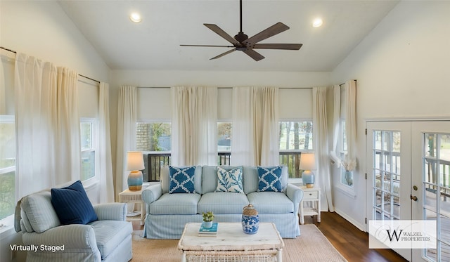 living room featuring ceiling fan, vaulted ceiling, recessed lighting, wood finished floors, and french doors