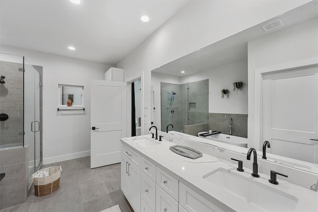 bathroom featuring vanity and plus walk in shower