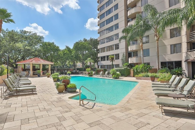 view of swimming pool featuring a gazebo and a patio