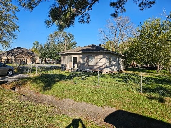 ranch-style house with a front yard