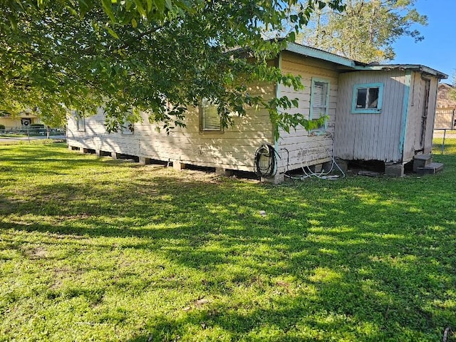 exterior space featuring a lawn