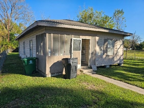 exterior space with a front yard