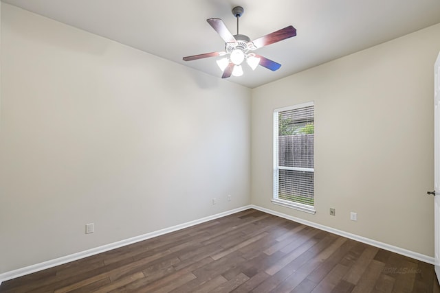 unfurnished room featuring ceiling fan and dark hardwood / wood-style flooring