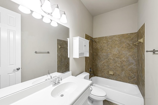 full bathroom with vanity, toilet, and tiled shower / bath