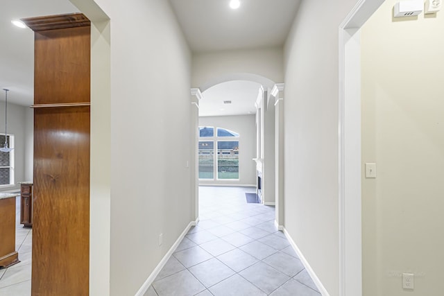 hallway featuring light tile patterned floors