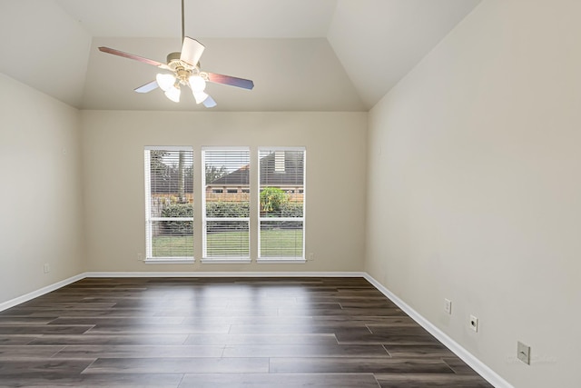 spare room with ceiling fan, dark hardwood / wood-style floors, and lofted ceiling