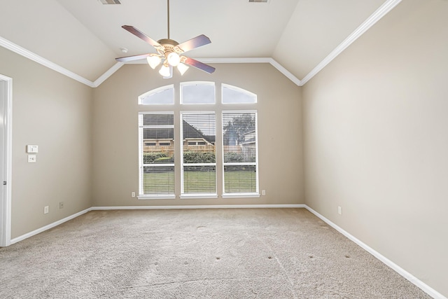 carpeted empty room featuring ceiling fan, lofted ceiling, and ornamental molding