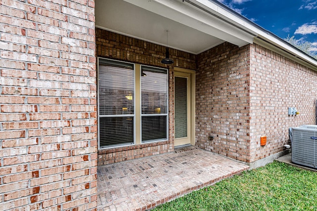 property entrance featuring cooling unit