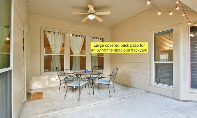 sunroom featuring ceiling fan