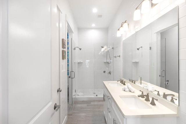 bathroom with vanity and walk in shower