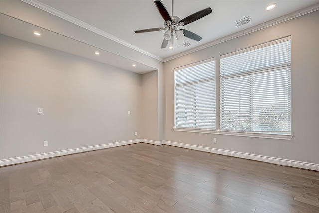 unfurnished room with light hardwood / wood-style flooring, ceiling fan, and ornamental molding