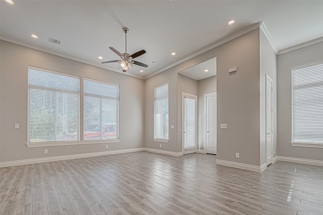 unfurnished room with light hardwood / wood-style flooring, ceiling fan, and ornamental molding