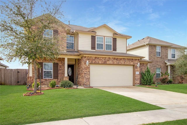 view of front of home with a front yard and a garage