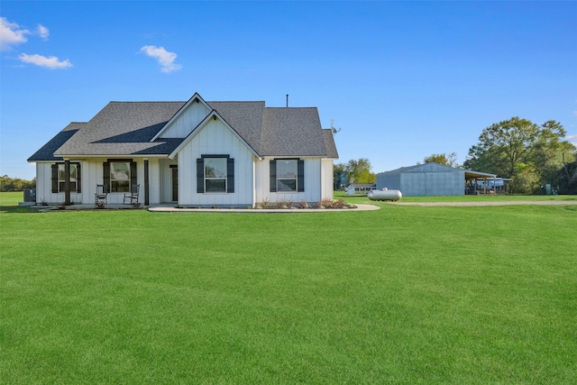 view of front of home with a front yard