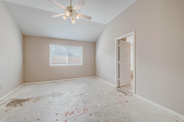 unfurnished room featuring ceiling fan and vaulted ceiling