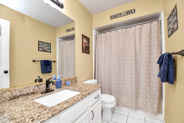 bathroom featuring tile patterned floors, vanity, toilet, and a shower with shower curtain