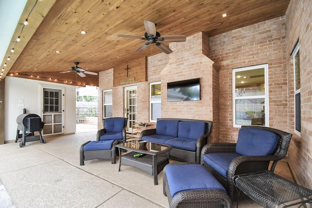 view of patio / terrace with ceiling fan and an outdoor hangout area