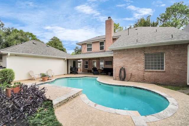 view of pool with a patio area