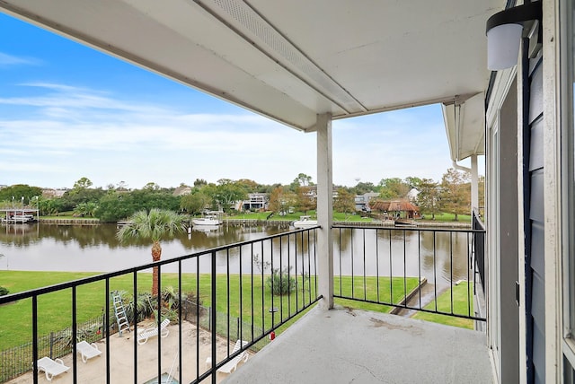 balcony featuring a water view