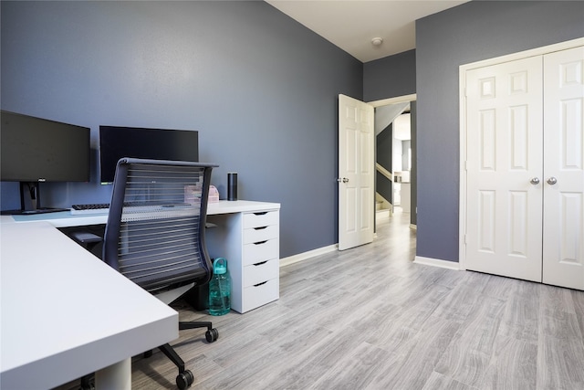 office space with light wood-type flooring