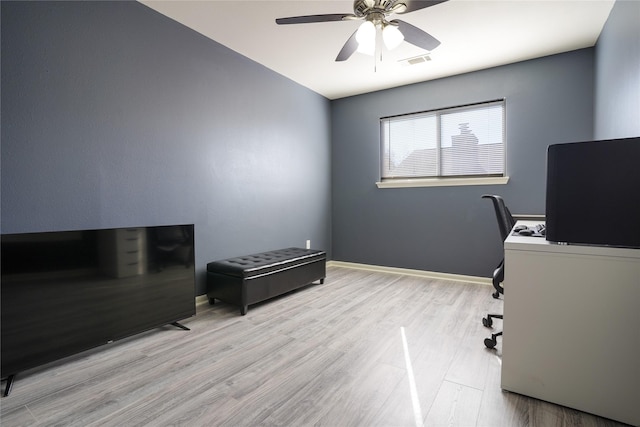 office featuring light hardwood / wood-style flooring and ceiling fan