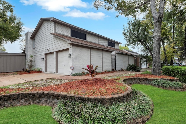 view of side of home with a garage