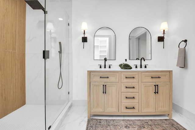 bathroom with vanity and a shower