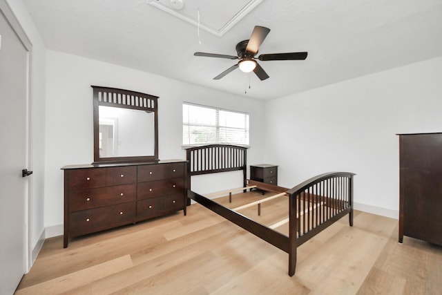 bedroom featuring ceiling fan and light hardwood / wood-style flooring