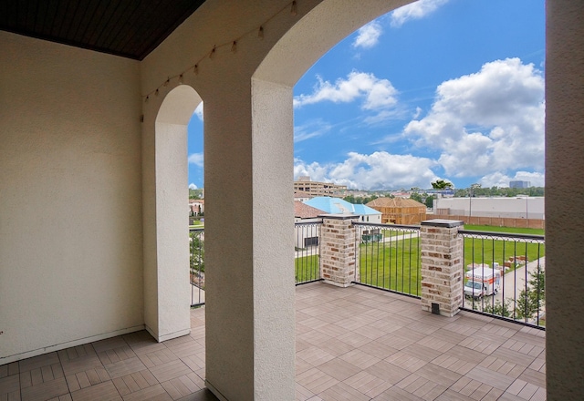 view of patio / terrace with a balcony