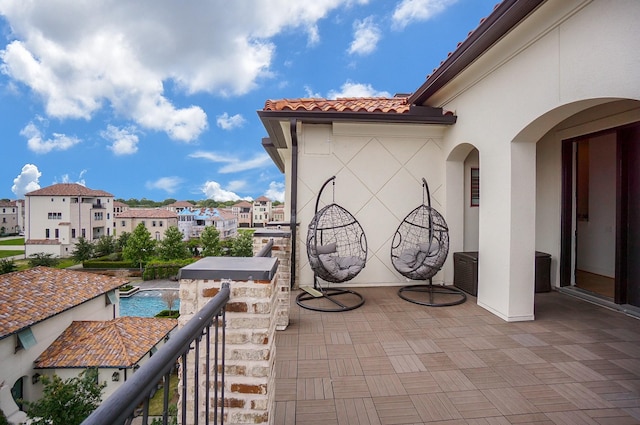 view of patio with a balcony