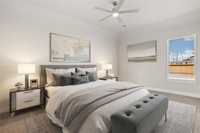23319 Persimmon Creek Ln, Katy, TX 77493 - bedroom with dark colored carpet and ceiling fan