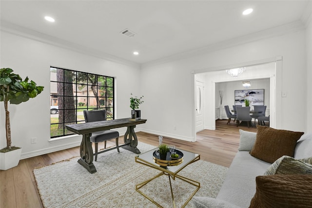 home office with crown molding, wood-type flooring, and a notable chandelier