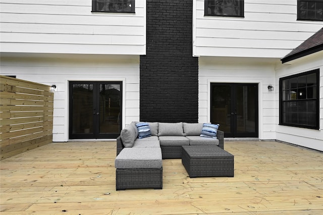 wooden deck featuring an outdoor hangout area and french doors