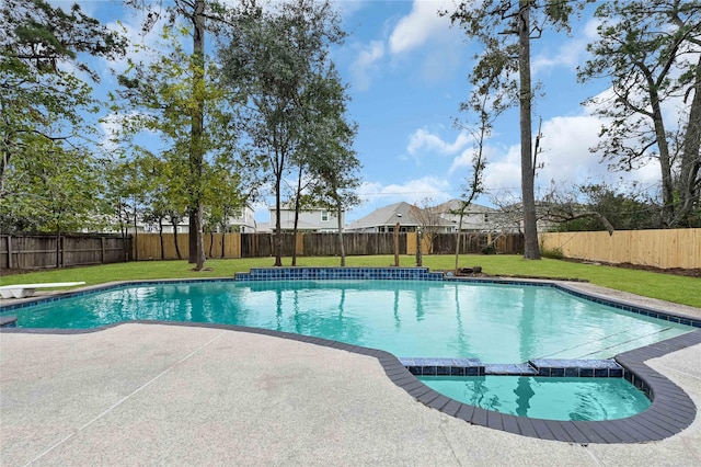 view of swimming pool featuring a patio and a lawn