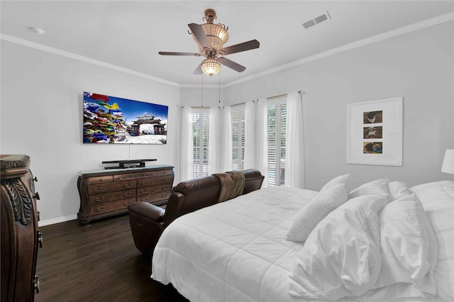 bedroom with dark hardwood / wood-style floors, ceiling fan, and crown molding