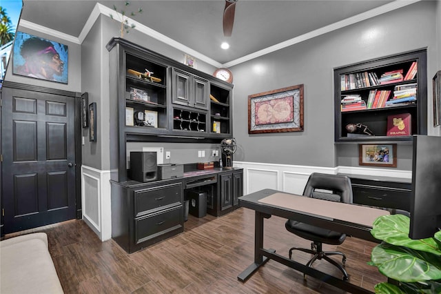 office area with crown molding, ceiling fan, and dark wood-type flooring