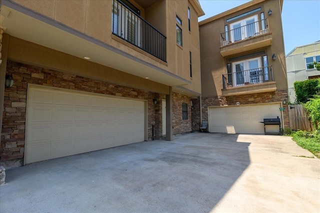 exterior space with area for grilling and a garage