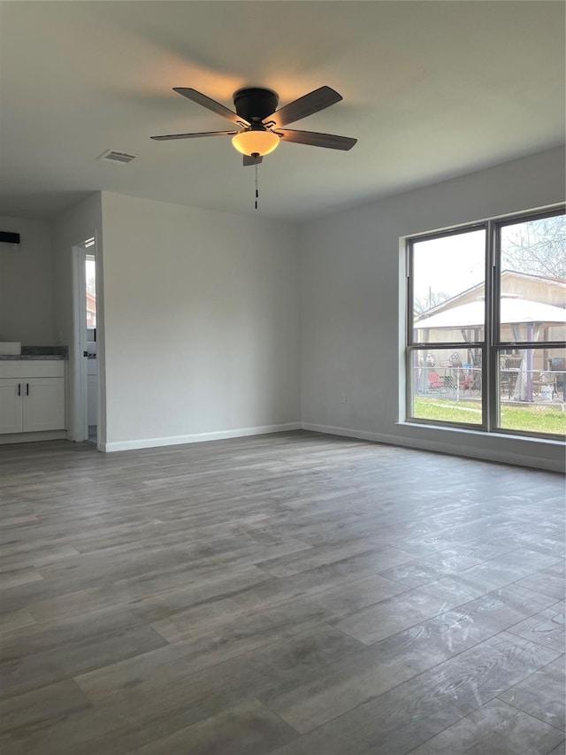 spare room featuring ceiling fan