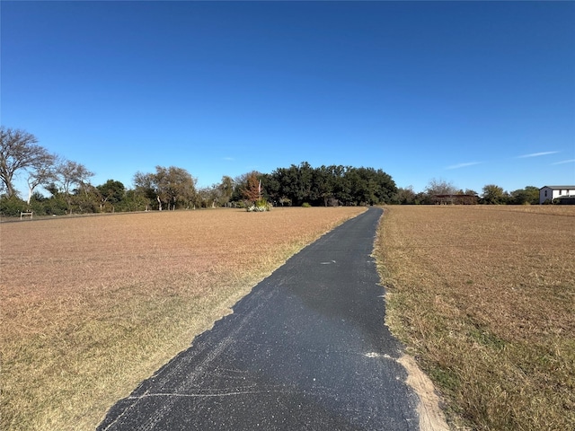 view of road featuring a rural view